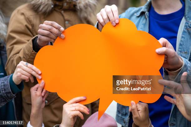 mixed ground of people with speech bubbles - asking stock pictures, royalty-free photos & images