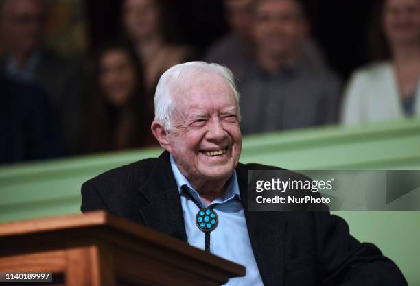 Former U.S. President Jimmy Carter speaks to the congregation at Maranatha Baptist Church before teaching Sunday school in his hometown of Plains,...