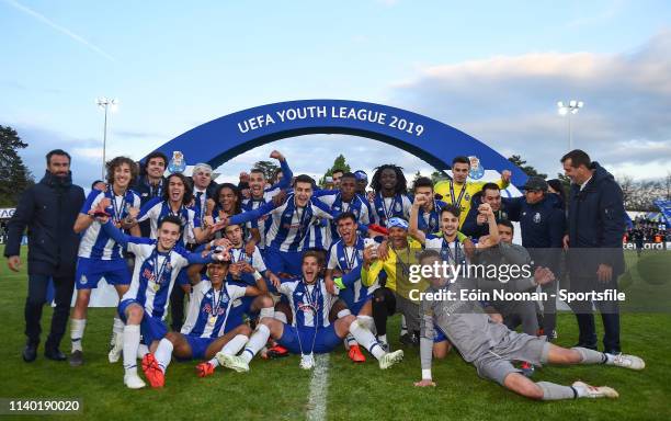 Porto players celebrate with the Lennart Johansson trophy after the Porto v Chelsea UEFA Youth League Final at Colovray Sports Centre on April 29,...