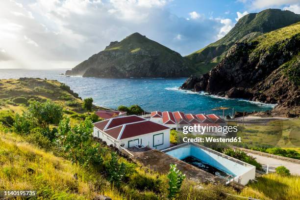 caribbean, netherland antilles, saba, view to bay - lesser antilles stock pictures, royalty-free photos & images