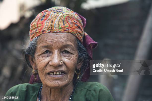 portrait of a poor indian woman in a village - traditional piercings stock pictures, royalty-free photos & images