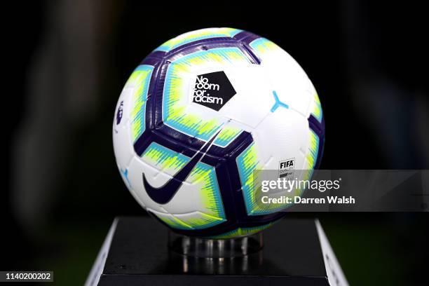 The match ball with a message of No Room for Racism is seen prior to the Premier League match between Chelsea FC and Brighton & Hove Albion at...