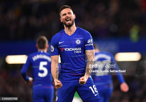 Olivier Giroud of Chelsea celebrates after scoring his team's first goal during the Premier League match between Chelsea FC and Brighton & Hove...