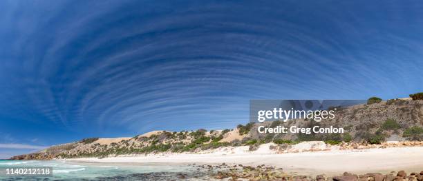 cirrocumulus clouds over beach - 巻積雲 ストックフォトと画像