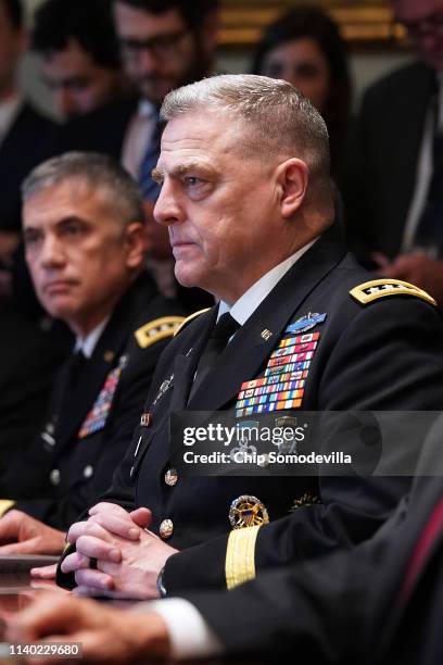 Army Chief of Staff General Mark Milley attends a briefing with President Donald Trump and other military leaders in the Cabinet Room at the White...