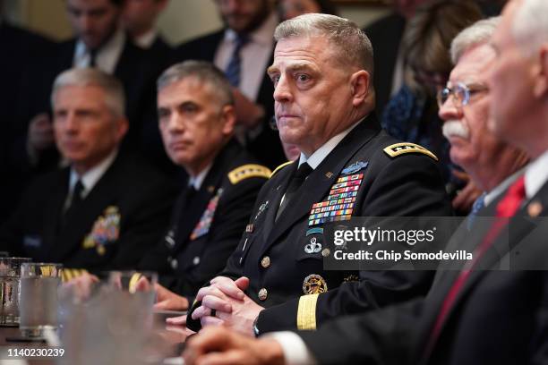 Army Chief of Staff General Mark Milley attends a briefing with President Donald Trump and other military leaders in the Cabinet Room at the White...