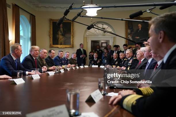 President Donald Trump talks to reporters during a briefing with military leaders, including acting Defense Secretary Patrick Shanahan , and others...