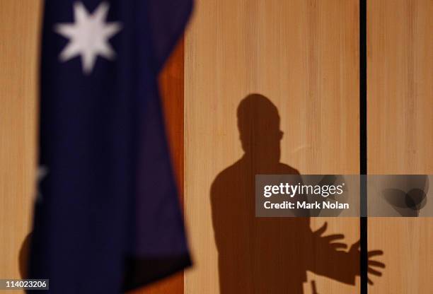 Shadow of Treasurer Wayne Swan is pictured as he delivers his fourth annual post-budget address to the media at Parliament House on May 11, 2011 in...