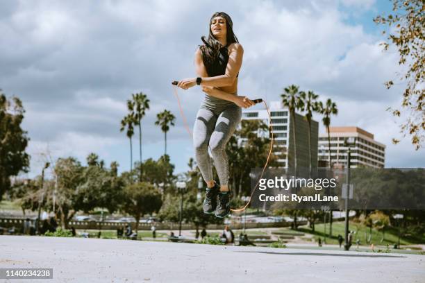 Woman Exercising In Los Angeles City Park