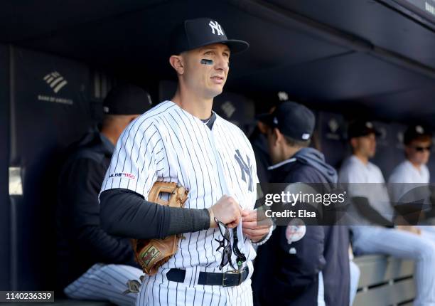 Troy Tulowitzki of the New York Yankees stands in the dugout before the game against the Detroit Tigers at Yankee Stadium on April 03, 2019 in the...