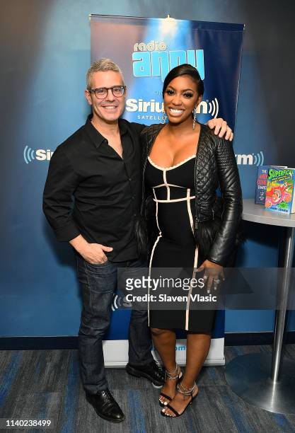 Radio/TV personality Andy Cohen and TV personality Porsha Williams pose for photos at Radio Andy SiriusXM Studios on April 29, 2019 in New York City.