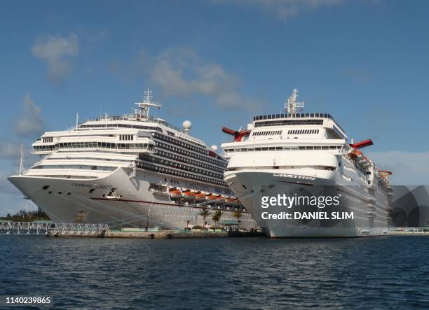 Carnival Cruise ships Liberty and Elation are seen in Nassau, Bahamas on April 29, 2019.