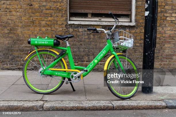 Lime E dockless Electric Bicycle is seen on a street in east London, England on April 29, 2019. The Green pay as you ride bikes called Lime-E which...