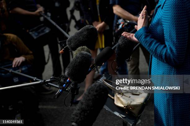 Counselor to the President Kellyanne Conway speaks to the press outside the White House after doing a TV interview on April 30 in Washington, DC.