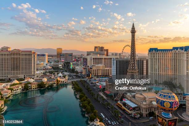 cityscape las vegas skyline at sunrise - trump international hotel & tower stock pictures, royalty-free photos & images