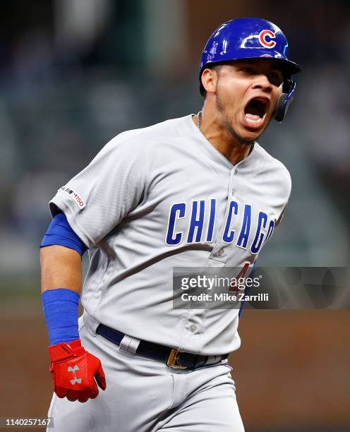 Catcher Willson Contreras of the Chicago Cubs yells after hitting a 2-run home run in the sixth inning during the game against the Atlanta Braves on...