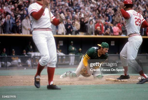 Catcher Gene Tenace of the Oakland Athletics in action against the Cincinnati Reds during the World Series in October 1972 at Riverfront Stadium in...
