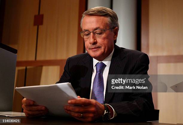 Treasurer Wayne Swan before he delivers his fourth annual post-budget address to the media at Parliament House on May 11, 2011 in Canberra,...