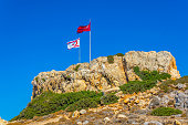 Flag of republic of northern cyprus on blue sky