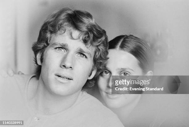American actor Ryan O'Neal and American actress Leigh Taylor-Young, UK, 30th August 1969.