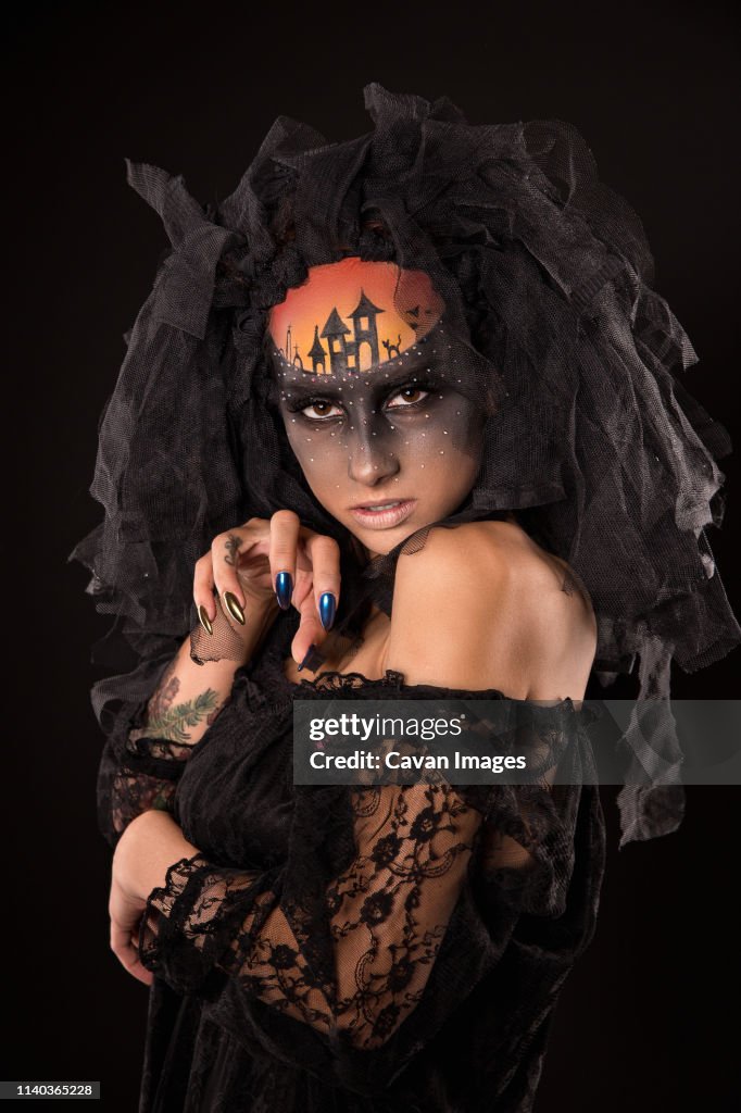 Halloween devil's bride with scary gothic makeup