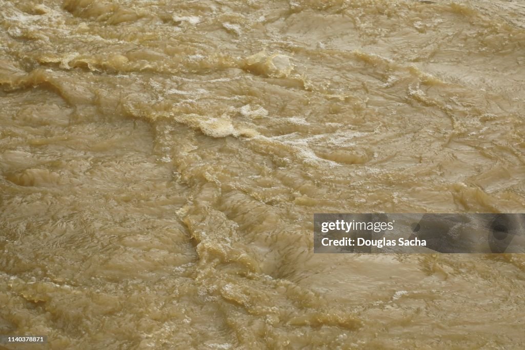 Turbulent water flowing after heavy rains