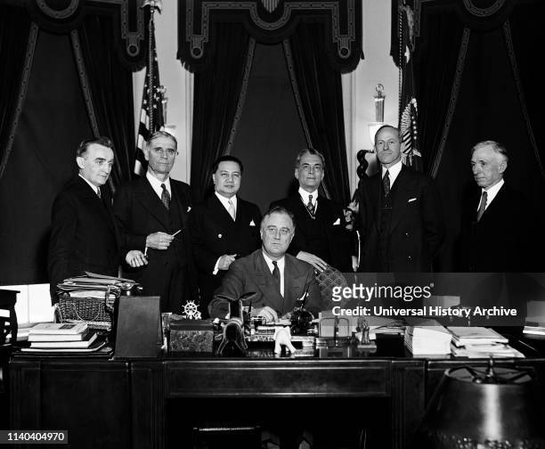 President Franklin Roosevelt Signing Philippine Independence Act Oval Office White House Washington DC USA Harris & Ewing March 24 1934.