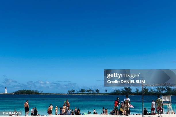 People enjoy Junkanoo beach in Nassau, Bahamas on April 30, 2019.