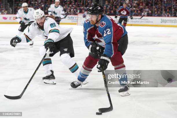 Colin Wilson of the Colorado Avalanche skates against Erik Karlsson of the San Jose Sharks in Game Three of the Western Conference Second Round...