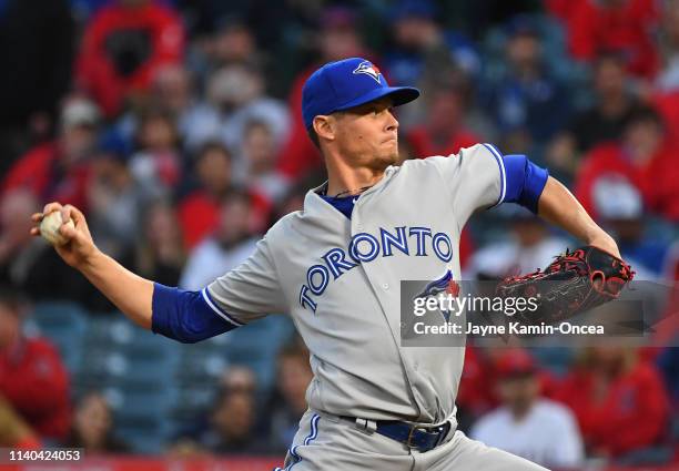 Clay Buchholz of the Toronto Blue Jays pitches in the first inning of the game Los Angeles Angels of Anaheim at Angel Stadium of Anaheim on April 30,...