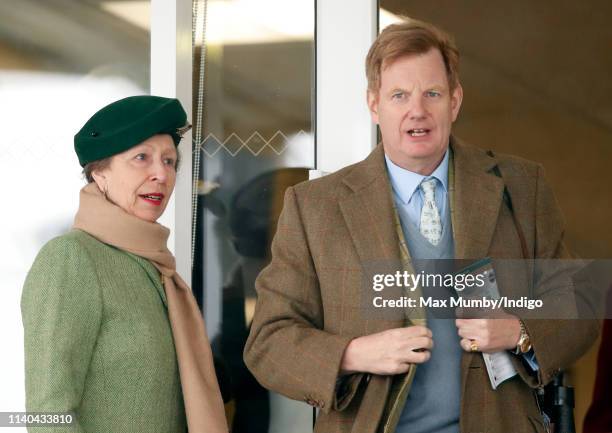 Princess Anne, Princess Royal and Edward Stanley, Earl of Derby watch the racing on day 1 of The Randox Health Grand National Festival at Aintree...