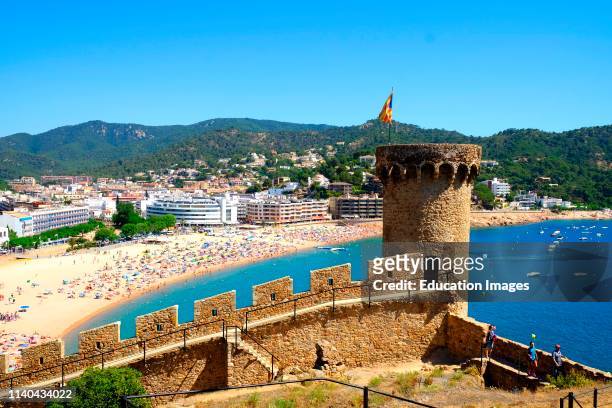 View of beach and town, from the old castle walls in tossa de mar, costa brave, Spain.