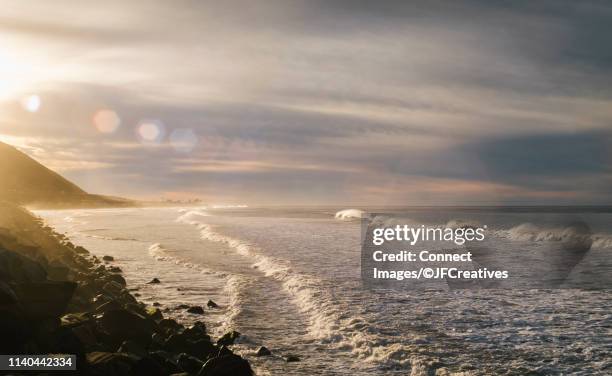 high tide on beach at sunrise, ventura, california, united states - ventura stock pictures, royalty-free photos & images