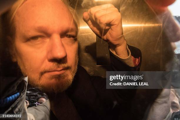 WikiLeaks founder Julian Assange arrives at court in London on May 1, 2019 to be sentenced for bail violation. - Assange will be sentenced today for...