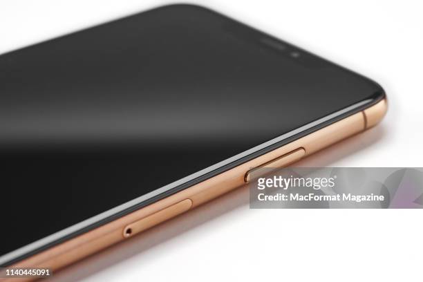 Detail of an Apple iPhone XS Max smartphone with a Gold finish, taken on October 2, 2018.