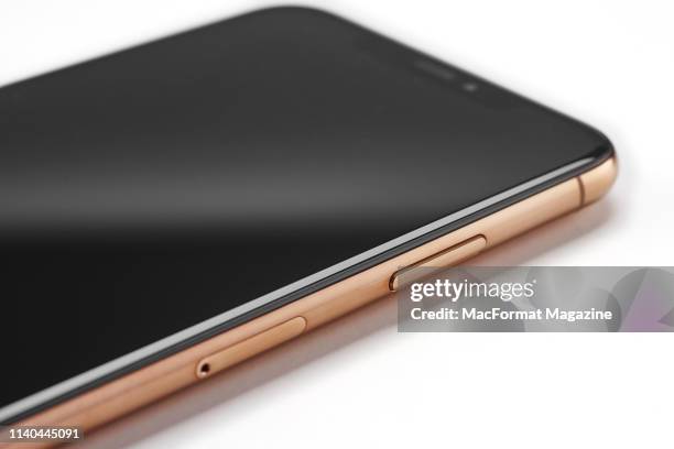 Detail of an Apple iPhone XS Max smartphone with a Gold finish, taken on October 2, 2018.