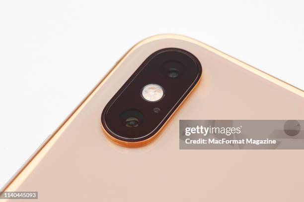 Detail of an Apple iPhone XS Max smartphone with a Gold finish, taken on October 2, 2018.