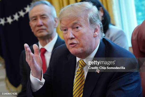 President Donald Trump and Chinese Vice Premier Liu He talk to reporters in the Oval Office at the White House April 04, 2019 in Washington, DC. The...