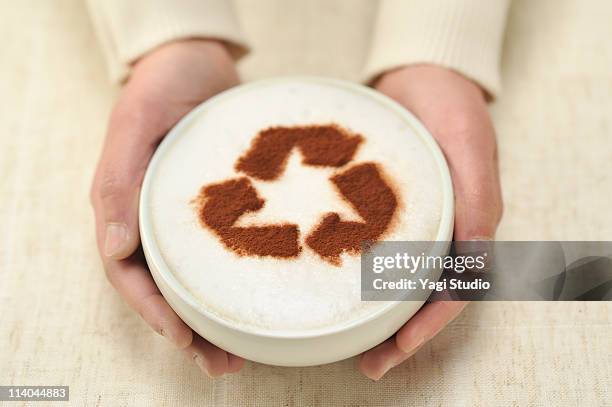 the cafe au lait which a recycling mark is on - fair trade stock pictures, royalty-free photos & images