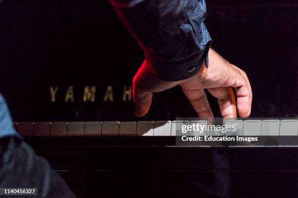 The hands of TERRY BREWER on piano with the BAYLOR PROJECT performing at the 61st Monterey Jazz Festival, Monterey, California.