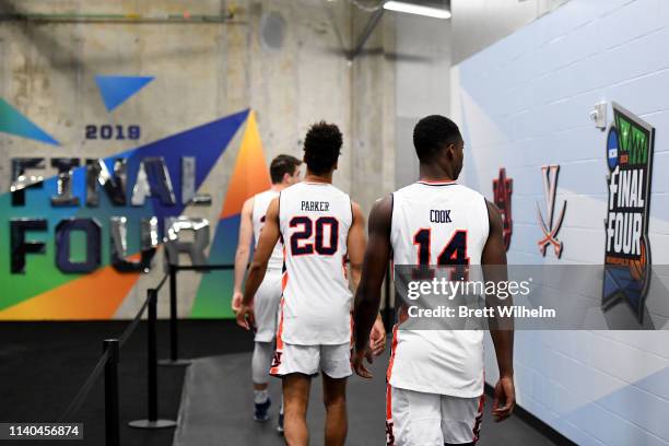 Myles Parker and Preston Cook of the Auburn Tigers head to the court ahead of the Men's Final Four at U.S. Bank Stadium on April 04, 2019 in...