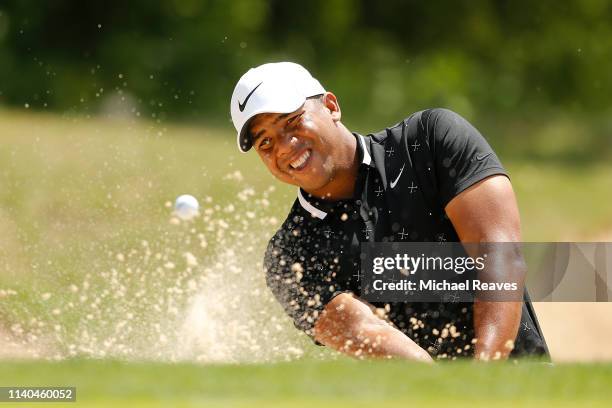 Jhonattan Vegas of Venezuela plays a shot from a bunker on the fourth hole during the first round of the 2019 Valero Texas Open at TPC San Antonio...