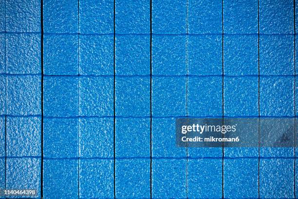 blue puzzle squares close together - solving rubix cube stock pictures, royalty-free photos & images
