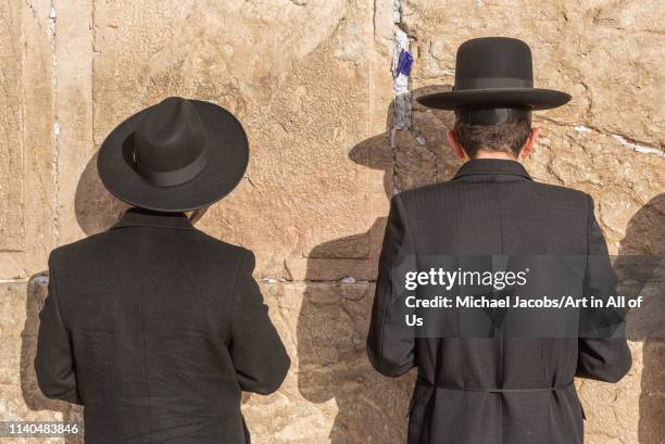 Israel, Jerusalem - 31 January 2019: Orhtodox Jews praying at the wailing wall