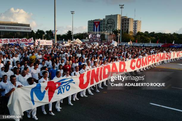 Cubans march during the May Day rally at the Revolution Square in Havana, on May 1, 2019.