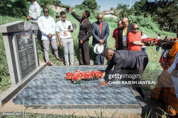 South African President Cyril Ramaphosa lays a wreath on the grave of anti apartheid stalwart and African National Congress leader Archie Gumede...