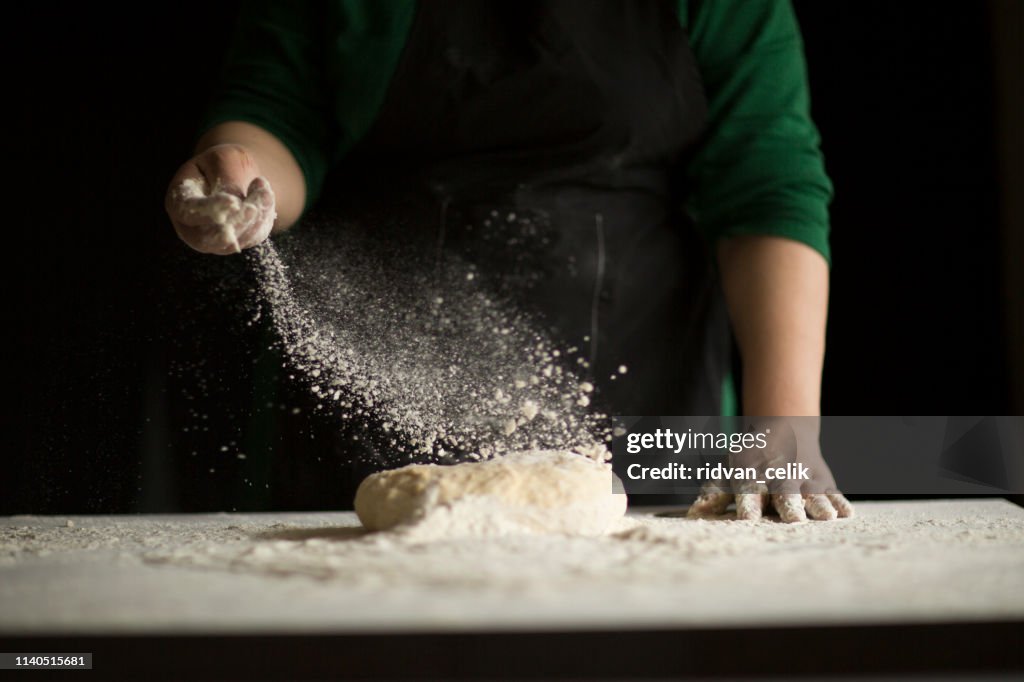 Kneading Loaf of Bread with Hands