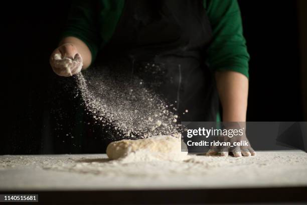 kneading loaf of bread with hands - baking bread imagens e fotografias de stock