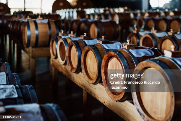 traditional balsamic vinegar barrels - módena fotografías e imágenes de stock