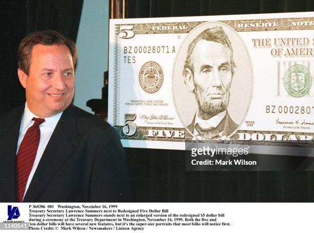 Washington, November 16, 1999 Treasury Secretary Lawrence Summers next to Redesigned Five Dollar Bill Treasury Secretary Lawrence Summers stands next...
